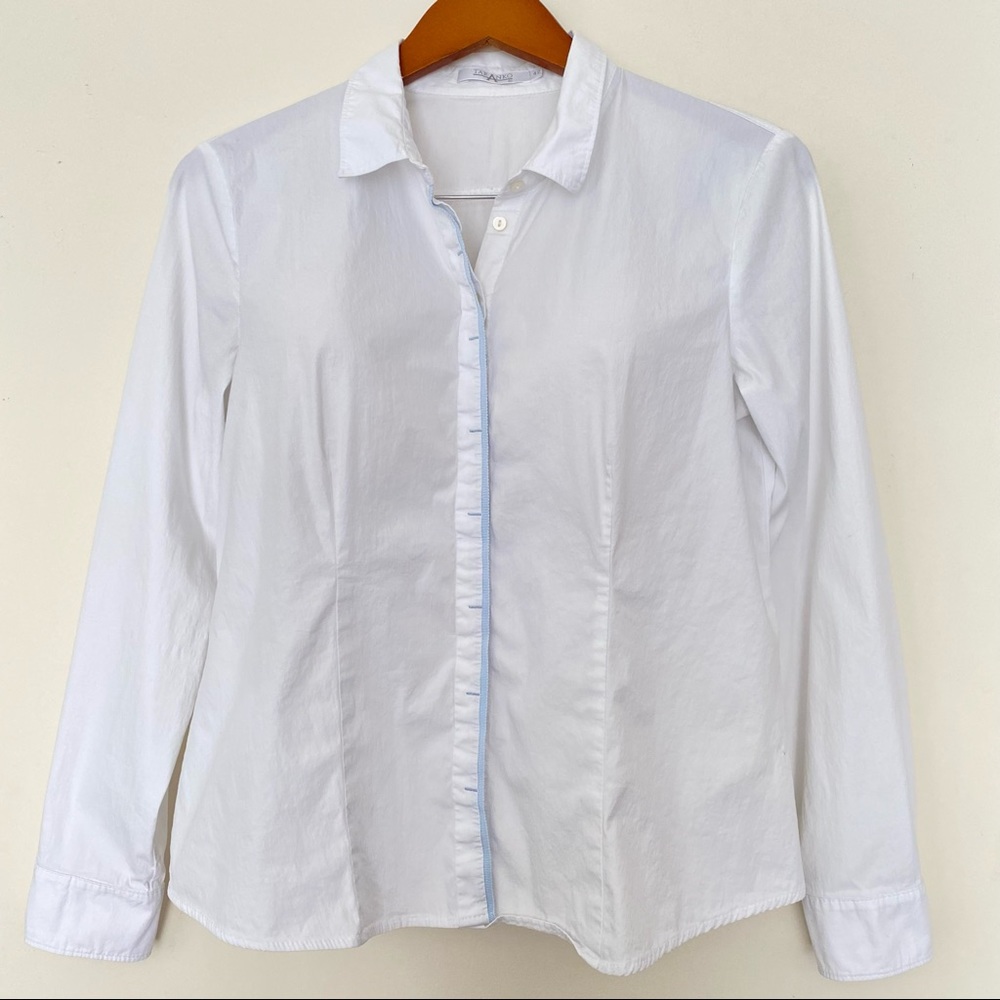 Woman white buttoned blouse